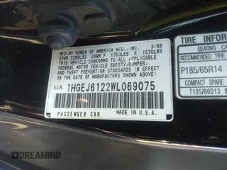 1998 Honda Civic DX with VIN 1HGEJ6122WL069075, listed as a IAAI auction lot 40932423 with 125,277 mi miles. Bid and sale history available at carsss.com. Image 9.