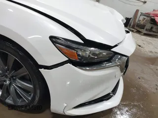 2019 Mazda 6 Grand Touring with VIN JM1GL1TYXK1505439, listed as a IAAI auction lot 41672678 with 52,990 mi miles and . Bid and sale history available at carsss.com. Image 19.