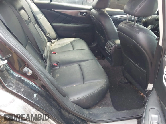 2014 Infiniti Q50 Premium z VIN JN1BV7AR4EM695666, wystawiony jako IAAI lot #42437594 z przebiegiem 141 008 mil mil oraz . Historia ofert i sprzedaży dostępna na DreamBid. Obrazek 8.