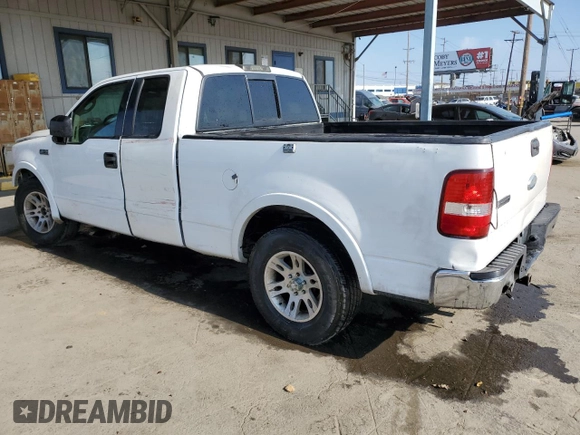 2006 Ford F-150 XLT with VIN 1FTPX12516KB96780, listed as a Copart auction lot 55621015 with 168,831 mi miles and Salvage title. Bid and sale history available at DreamBid. Image 2.
