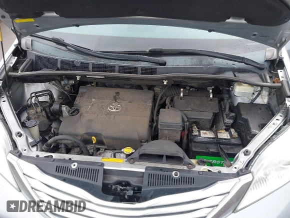2012 Toyota Sienna XLE AAS z VIN 5TDYK3DC1CS192310, wystawiony jako IAAI lot #41379303 z przebiegiem 119 524 mil mil oraz . Historia ofert i sprzedaży dostępna na DreamBid. Obrazek 10.
