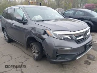 2020 Honda Pilot EX-L with VIN 5FNYF6H5XLB024719, listed as a IAAI auction lot 42168150 with 90,933 mi miles and . Bid and sale history available at carsss.com. Image 1.