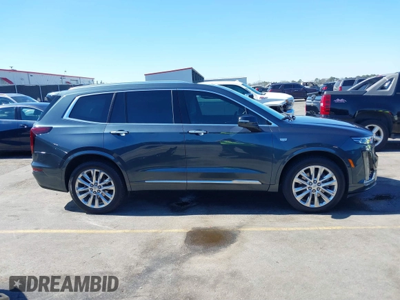 2021 Cadillac XT6 Premium Luxury with VIN 1GYKPERS0MZ110029, listed as a IAAI auction lot 41669104 with 58,890 mi miles and . Bid and sale history available at DreamBid. Image 13.