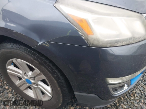2013 Chevrolet Traverse LT with VIN 1GNKVGKD5DJ130012, listed as a IAAI auction lot 41909148 with 169,485 mi miles and . Bid and sale history available at DreamBid. Image 14.