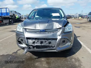 2014 Ford Escape SE with VIN 1FMCU9G96EUA06567, listed as a IAAI auction lot 41954345 with 88,294 mi miles and . Bid and sale history available at DreamBid. Image 12.