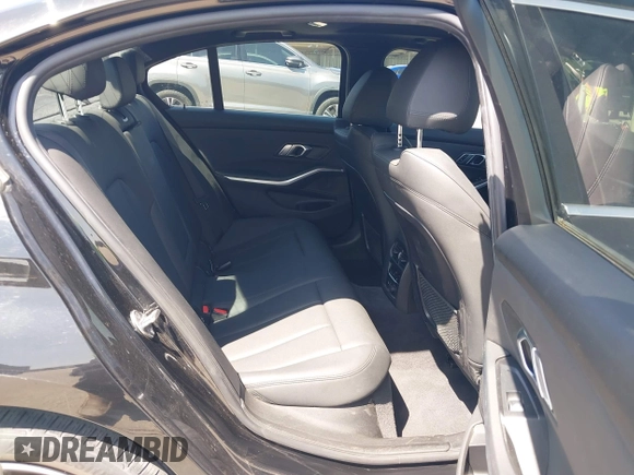2019 BMW 3 Series 330i with VIN WBA5R1C51KFH09402, listed as a IAAI auction lot 41869138 with 59,115 mi miles and . Bid and sale history available at DreamBid. Image 8.