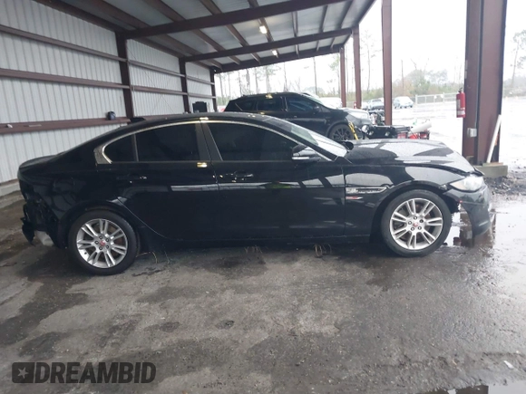 2017 Jaguar XE 25t Premium with VIN SAJAD4BG7HA966895, listed as a IAAI auction lot 41288998 with 158,391 mi miles. Bid and sale history available at carsss.com. Image 13.