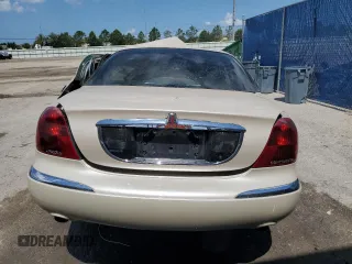 2000 Lincoln Continental with VIN 1LNHM97V5YY785721, listed as a Copart auction lot 57934824 with 0 mi miles and Non Repairable. Bid and sale history available at carsss.com. Image 6.