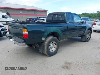 2003 Toyota Tacoma z VIN 5TEWM72N03Z296853, wystawiony jako IAAI lot #42385361 z przebiegiem 132 149 mil mil oraz . Historia ofert i sprzedaży dostępna na DreamBid. Obrazek 4.