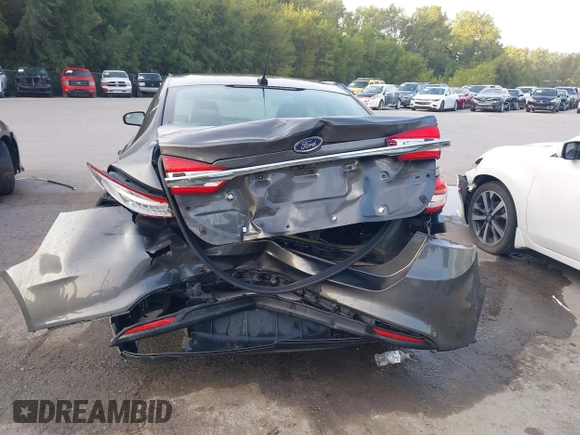 2017 Ford Fusion S with VIN 3FA6P0G76HR121500, listed as a IAAI auction lot 40308024 with 130,325 mi miles. Bid and sale history available at carsss.com. Image 6.