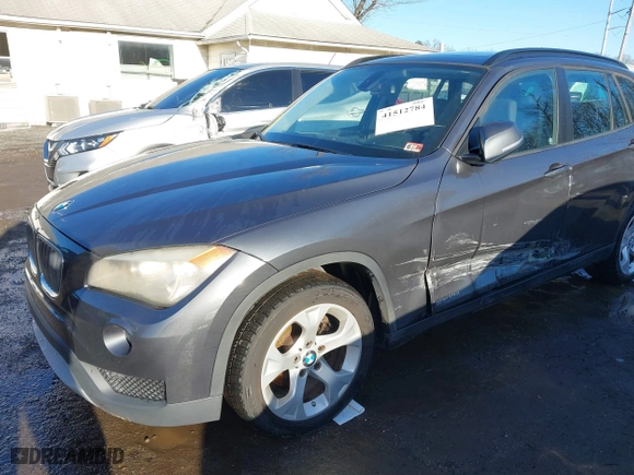 2014 BMW X1 sDrive28i with VIN WBAVM1C52EVW55890, listed as a IAAI auction lot 41512784 with 97,718 mi miles. Bid and sale history available at carsss.com. Image 6.