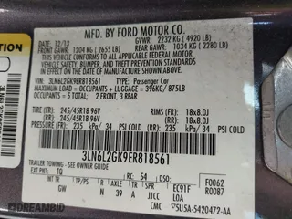 2014 Lincoln MKZ with VIN 3LN6L2GK9ER818561, listed as a IAAI auction lot 42063387 with 143,803 mi miles. Bid and sale history available at carsss.com. Image 9.