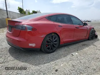 2016 Tesla Model S 90D with VIN 5YJSA1E42GF127593, listed as a Copart auction lot 52450495 with 144,151 mi miles and Salvage title. Bid and sale history available at DreamBid. Image 3.