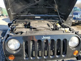 2013 Jeep Wrangler Sport with VIN 1C4AJWAG2DL699264, listed as a Copart auction lot 46889475 with 109,485 mi miles and Salvage Title. Bid and sale history available at carsss.com. Image 11.
