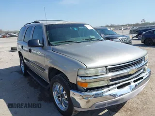 2004 Chevrolet Tahoe LT with VIN 1GNEC13Z84J315648, listed as a IAAI auction lot 41868112 with 198,901 mi miles. Bid and sale history available at carsss.com. Image 1.