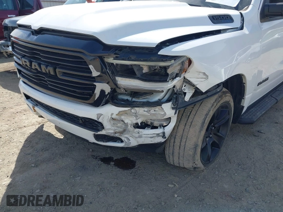 2021 Ram 1500 Big Horn with VIN 1C6SRFFT0MN521027, listed as a IAAI auction lot 41830596 with 55,013 mi miles and . Bid and sale history available at DreamBid. Image 12.