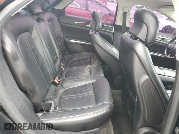2016 Lincoln MKZ Hybrid z VIN 3LN6L2LU9GR606432, wystawiony jako Copart lot #58596655 z przebiegiem 113 478 mil mil oraz Szkoda całkowita • Salvage title. Historia ofert i sprzedaży dostępna na DreamBid. Obrazek 10.