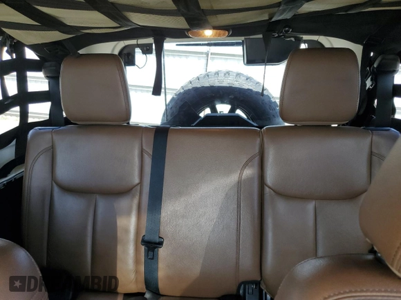 2016 Jeep Wrangler Unlimited Rubicon z VIN 1C4HJWFGXGL236560, wystawiony jako Copart lot #57528355 z przebiegiem 64 634 mil mil oraz Szkoda całkowita • Salvage title. Historia ofert i sprzedaży dostępna na DreamBid. Obrazek 10.