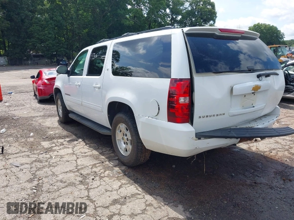 2014 Chevrolet Suburban LT with VIN 1GNSCJE07ER211222, listed as a IAAI auction lot 42428084 with 214,712 mi miles and . Bid and sale history available at DreamBid. Image 3.