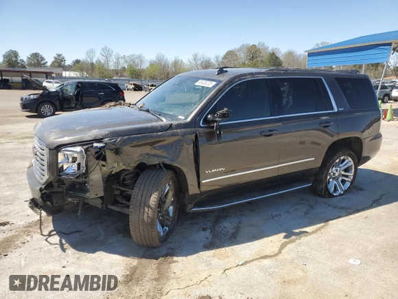 2019 GMC Yukon SLT with VIN 1GKS1BKC1KR117730, listed as a Copart auction lot 49438235 with 147,347 mi miles and Salvage Title. Bid and sale history available at carsss.com. Image 1.