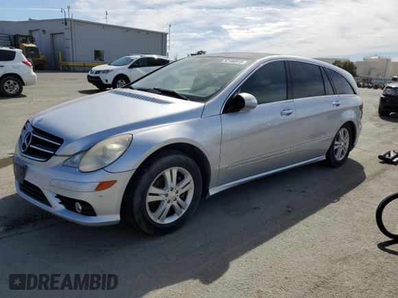 2009 Mercedes-Benz R 3.5L with VIN 4JGCB65E79A091057, listed as a Copart auction lot 52186915 with 99,173 mi miles and Salvage Title. Bid and sale history available at DreamBid. Image 1.