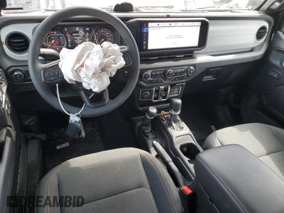 2024 Jeep Gladiator Sport S with VIN 1C6HJTAG7RL120930, listed as a Copart auction lot 55958815 with 7,828 mi miles and Salvage title. Bid and sale history available at DreamBid. Image 8.