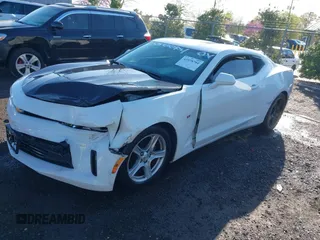 2017 Chevrolet Camaro 1LT with VIN 1G1FA1RX6H0136098, listed as a IAAI auction lot 41978704 with 136,637 mi miles and . Bid and sale history available at carsss.com. Image 17.