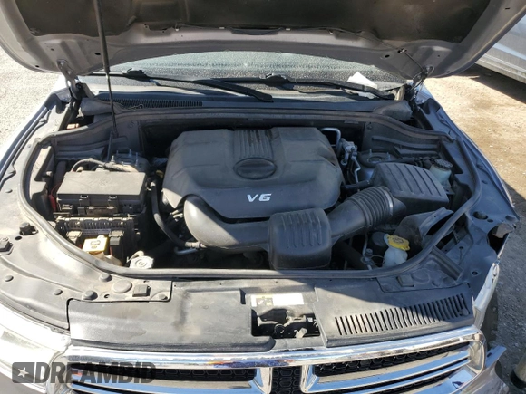 2014 Dodge Durango SXT z VIN 1C4RDJAG6EC972818, wystawiony jako Copart lot #54791215 z przebiegiem 169 718 mil mil oraz Szkoda całkowita • Salvage title. Historia ofert i sprzedaży dostępna na DreamBid. Obrazek 11.