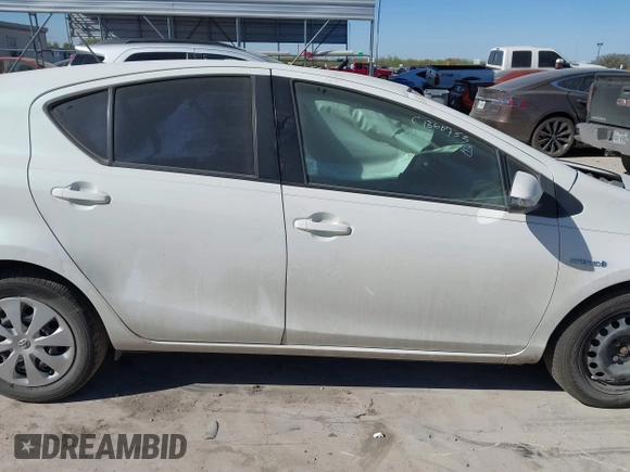 2014 Toyota Prius One with VIN JTDKDTB32E1069313, listed as a IAAI auction lot 41848910 with 287,698 mi miles and . Bid and sale history available at DreamBid. Image 13.