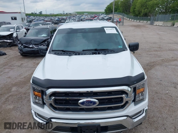 2021 Ford F-150 XL z VIN 1FTFW1ED7MFB36946, wystawiony jako IAAI lot #42318029 z przebiegiem 16 960 mil mil oraz . Historia ofert i sprzedaży dostępna na DreamBid. Obrazek 6.