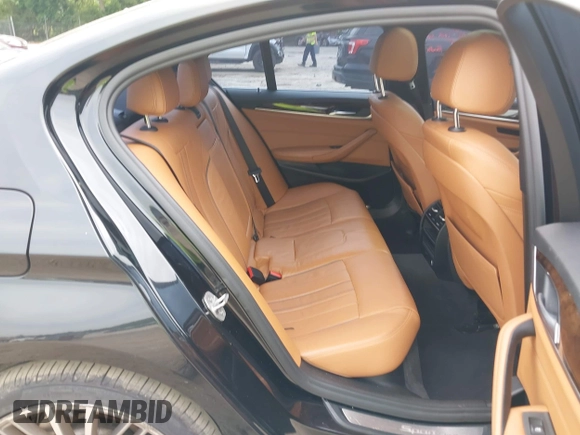 2017 BMW 5 Series 530i z VIN WBAJA5C31HWA35160, wystawiony jako IAAI lot #42405681 z przebiegiem 100 630 mil mil oraz . Historia ofert i sprzedaży dostępna na DreamBid. Obrazek 8.
