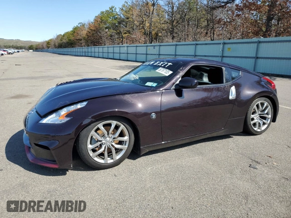 2014 Nissan 370Z Touring with VIN JN1AZ4EH6EM633637, listed as a Copart auction lot 50797105 with 0 mi miles and Salvage Title. Bid and sale history available at carsss.com. Image 1.