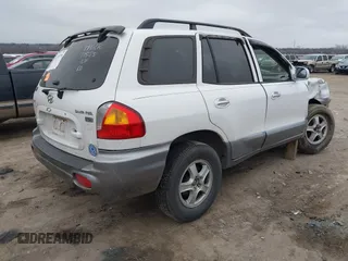 2003 Hyundai Santa Fe GLS with VIN KM8SC13E33U520344, listed as a IAAI auction lot 41528796 with 246,923 mi miles. Bid and sale history available at carsss.com. Image 4.