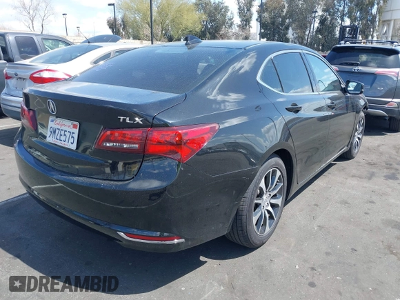 2015 Acura TLX with VIN 19UUB1F36FA011026, listed as a IAAI auction lot 41905909 with 106,519 mi miles and . Bid and sale history available at DreamBid. Image 4.