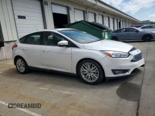 2017 Ford Focus Titanium with VIN 1FADP3N24HL206365, listed as a Copart auction lot 63199965 with 51,435 mi miles and Salvage title. Bid and sale history available at DreamBid. Image 4.