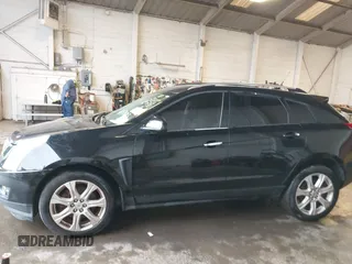2014 Cadillac SRX Performance Collection with VIN 3GYFNFE39ES659013, listed as a IAAI auction lot 42264069 with 129,122 mi miles and . Bid and sale history available at DreamBid. Image 14.