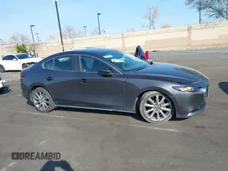 2019 Mazda 3 w/Select with VIN 3MZBPAAL1KM105498, listed as a IAAI auction lot 41601386 with 113,203 mi miles. Bid and sale history available at carsss.com. Image 14.