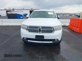 2013 Dodge Durango SXT with VIN 1C4RDJAG7DC659050, listed as a IAAI auction lot 42637236 with 162,458 mi miles and . Bid and sale history available at DreamBid. Image 12.