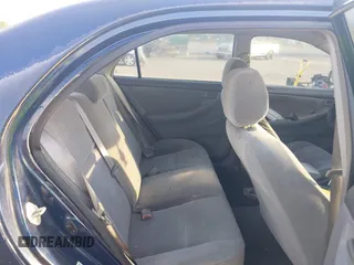 2005 Toyota Corolla CE with VIN 1NXBR32E25Z563569, listed as a IAAI auction lot 42100384 with 243,610 mi miles and . Bid and sale history available at DreamBid. Image 8.