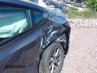 2022 Tesla Model 3 Long Range z VIN 5YJ3E1EB6NF260118, wystawiony jako IAAI lot #42139962 z przebiegiem 52 566 mil mil oraz . Historia ofert i sprzedaży dostępna na DreamBid. Obrazek 6.