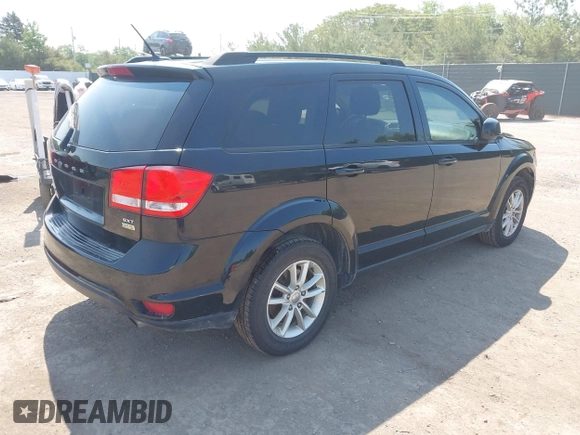 2015 Dodge Journey SXT with VIN 3C4PDCBG5FT668662, listed as a IAAI auction lot 42358666 with 176,278 mi miles and . Bid and sale history available at DreamBid. Image 4.