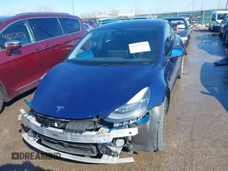 2021 Tesla Model 3 Long Range with VIN 5YJ3E1EB6MF990089, listed as a IAAI auction lot 41607316 with 25,223 mi miles and . Bid and sale history available at DreamBid. Image 13.