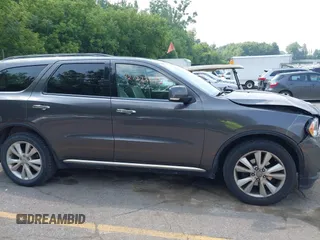 2013 Dodge Durango Crew with VIN 1C4RDJDG0DC693522, listed as a IAAI auction lot 42722229 with 138,585 mi miles and . Bid and sale history available at DreamBid. Image 13.