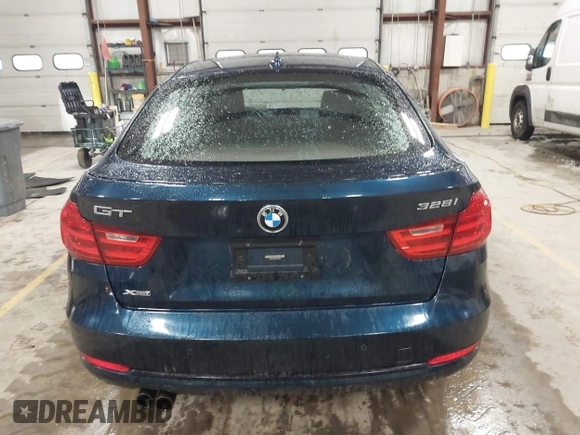 2014 BMW 3 Series 328i Gran Turismo xDrive with VIN WBA3X5C5XED557668, listed as a IAAI auction lot 41728522 with 123,393 mi miles and . Bid and sale history available at DreamBid. Image 16.