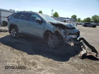 2022 Toyota RAV4 XLE with VIN 2T3P1RFV1NW259179, listed as a Copart auction lot 57253525 with 55,764 mi miles and Salvage title. Bid and sale history available at DreamBid. Image 4.