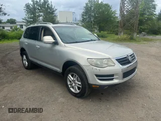 2008 Volkswagen Touareg V6 with VIN WVGBE77L58D004211, listed as a Copart auction lot 65097405 with 215,565 mi miles and Clean title. Bid and sale history available at DreamBid. Image 1.