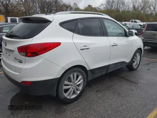2013 Hyundai Tucson GLS with VIN KM8JU3AC4DU675511, listed as a IAAI auction lot 40765852 with 147,061 mi miles. Bid and sale history available at carsss.com. Image 4.