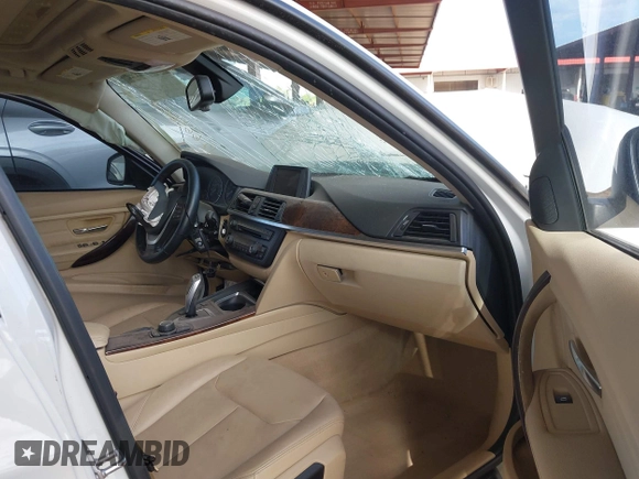 2014 BMW 3 Series 328i with VIN WBA3C1C53EK113046, listed as a IAAI auction lot 42665663 with Not provided miles and . Bid and sale history available at DreamBid. Image 5.