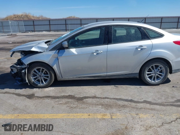2018 Ford Focus SE with VIN 1FADP3F23JL315341, listed as a IAAI auction lot 41834939 with 121,686 mi miles. Bid and sale history available at carsss.com. Image 14.