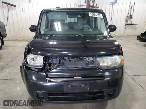2009 Nissan Cube SL z VIN JN8AZ28R19T103579, wystawiony jako Copart lot #52356245 z przebiegiem 163 699 mil mil oraz Szkody całkowita. Historia ofert i sprzedaży dostępna na DreamBid. Obrazek 5.